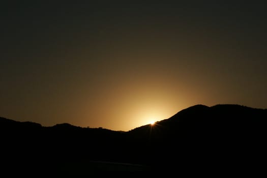 beautiful sunset above mountain, horizontally framed shot