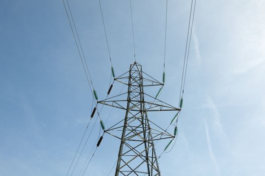 A electrical pylon with a blue sky