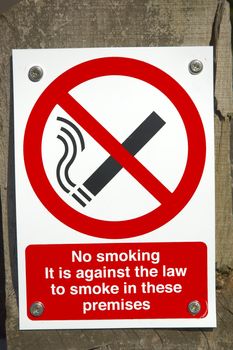 In England this is the sign used to ban smoking in work areas