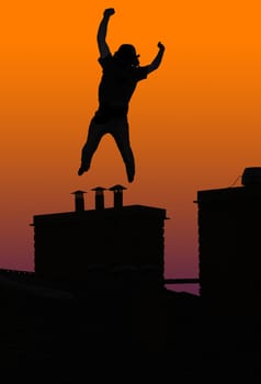 Happy or crazy man jumping on chimney