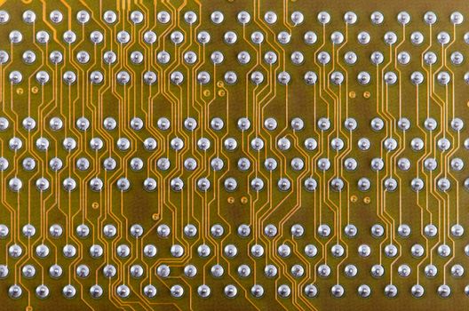 Industrial electronic yellow background of the computer motherboard