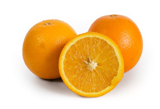 Isolated oranges with shadow on white background. Clipping path included.