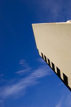 Beige wall of modern house under unusual viewing angle