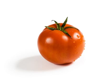 Red tomato with shadow isolated on white background. Clipping path included.