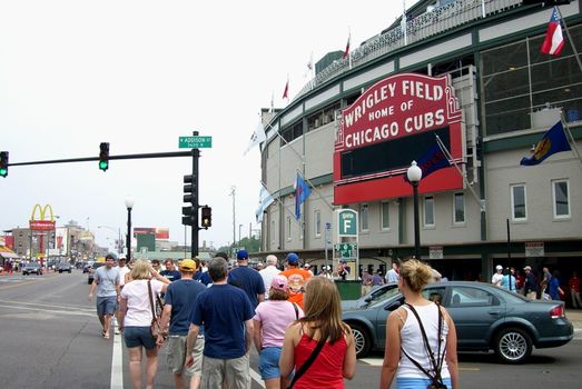 Chicago Cubs fans head to a spring baseball game