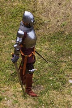 Armoured knight with sword in medieval festival