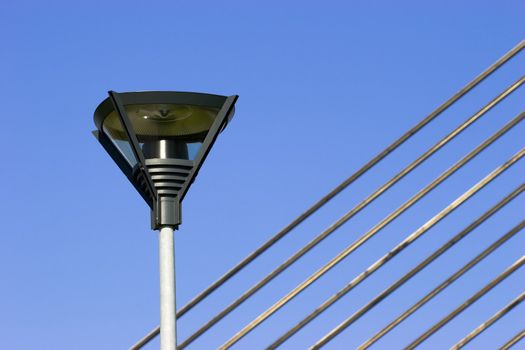 lamppost and fragment of suspension bridge cables