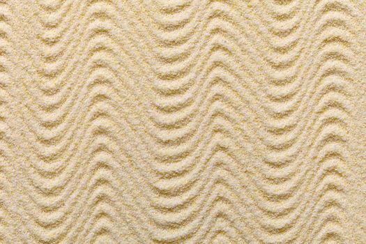 Sandy yellow decorative background with waves