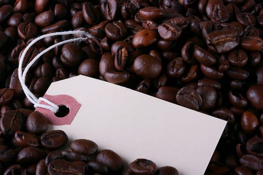 Packing label with a rope outset on scattered coffee grains.