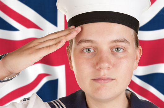 young female sailor saluting in front the union jack