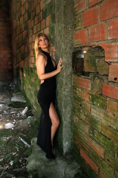 Sexy fashion girl in old building