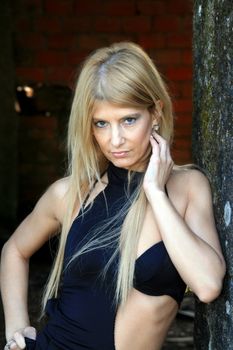 Sexy fashion girl in old building