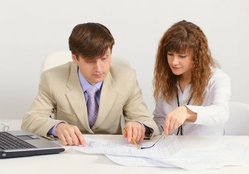 Young engineers in the office at work