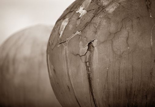 Old spheres with cracks close-up