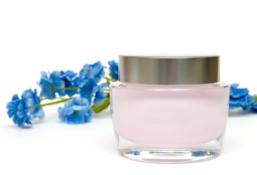 moisturizer cream and flower