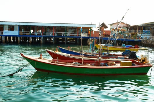 Boats, buildings, beach � seacoast urban landscape.