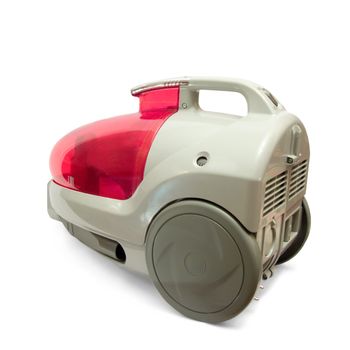 Red household vacuum cleaner on white 