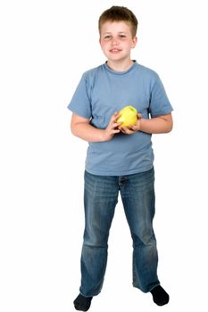 little boy with an apple stands on a white background