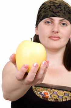 Apple close up. The girl gives fruit.