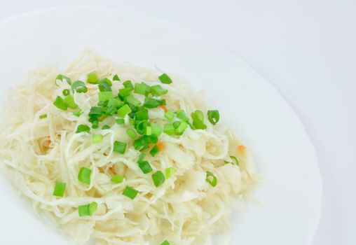 Sauerkraut with Spring Onions on White Plate, Close-Up