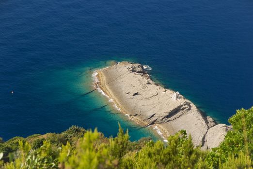aerial view of Chiappa point in mediterranean sea, Liguria, Italy. Photo taken with polarized filter