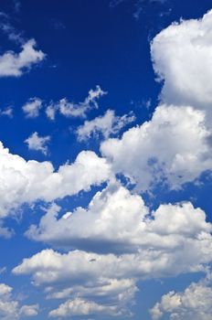 Background of blue sky with white clouds