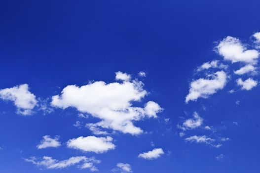 Background of blue sky with white clouds