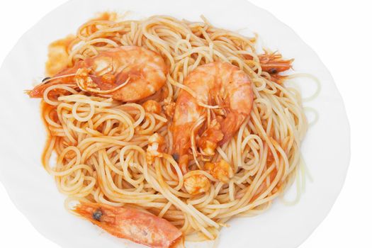 plate of spaghetti with shrimps and tomato sauce isolated on white background