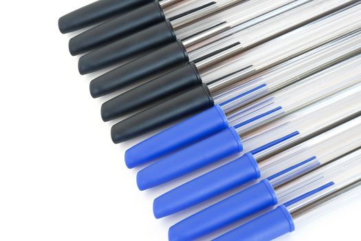 group of black and blue pens isolated on white background