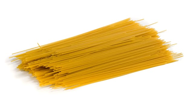 Isolated yellow spaghetti with shadow on white background. Clipping path included to remove object shadow or replace background.