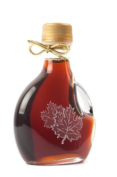 Maple Syrup Bottle isolated on a white background. Image is at 21 megapixels.