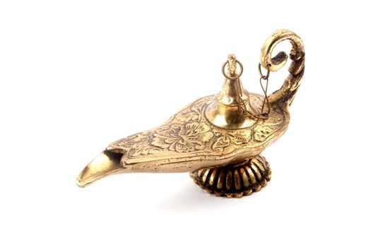 A golden magic lamp isolated on a white background. Image is at 21 megapixels.