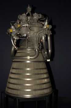 A rocket engine with a black background