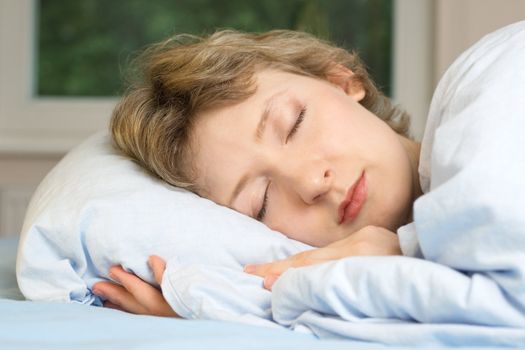 young woman sleeping, shallow DOF, focus on eyes