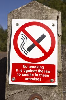 In England this is the sign used to ban smoking in work areas