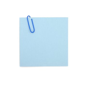 A close up of a paperclip on a sticky note shot against a white background.