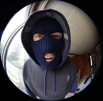 Masked man through fish eye