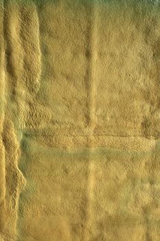 Abstract yellow foam background. Texture of foam covering the wall of a building under construction.