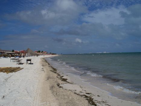 white sands of a mexican resort beach