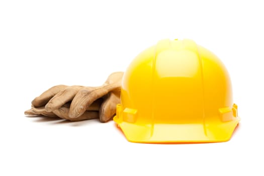 Yellow Hard Hat and Gloves Isolated on White.