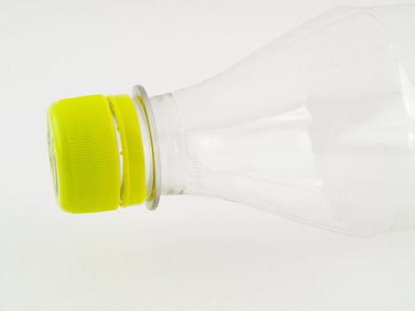PVCu Plastic Bottle With Green Cap Screwed on Clear Bottle