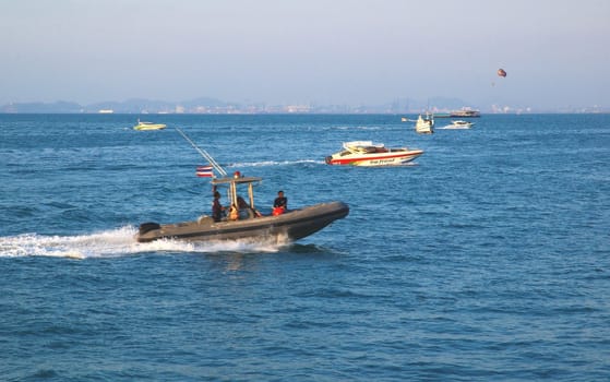 Boats, buildings, beach � modern seacoast urban landscape.