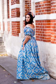 Portrait of lady in blue baroque dress
