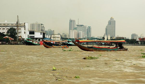 Bangkok � city of contrasts, canals skyscrapers and slums, markets and sanctuaries.