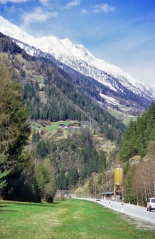 A road trip through the Austrian Alps takes you through snow capped peaks.