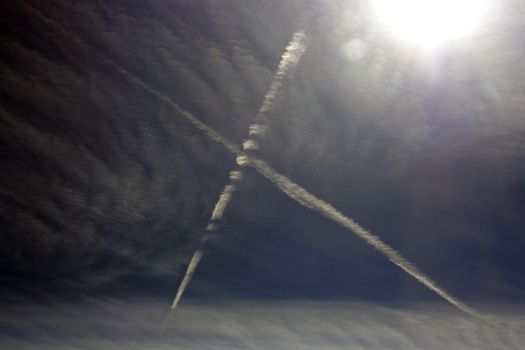jet plains forming an x in the sky