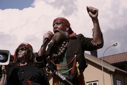 a couple of pirates singing and shouting at an annual pirate festival i Holmestrand, Norway.