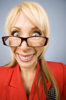 Happy woman wearing glasses in red with a big smile