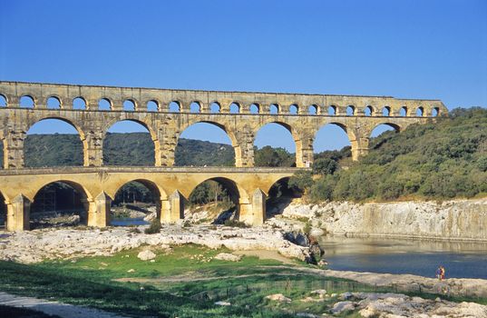 The Pont du Gard is the remains of a roman aqueduct found near Nimes, in the Provence region of France.