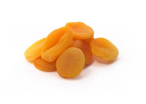 Lot of dried apricots isolated on white background with clipping path